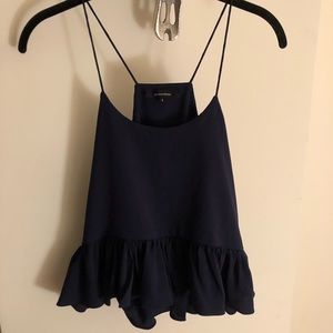 Navy sleeveless peplum blouse